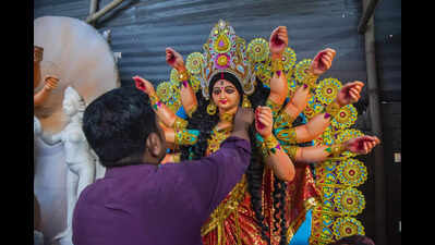 Artists bring Durga idols to life in NCR | Delhi News